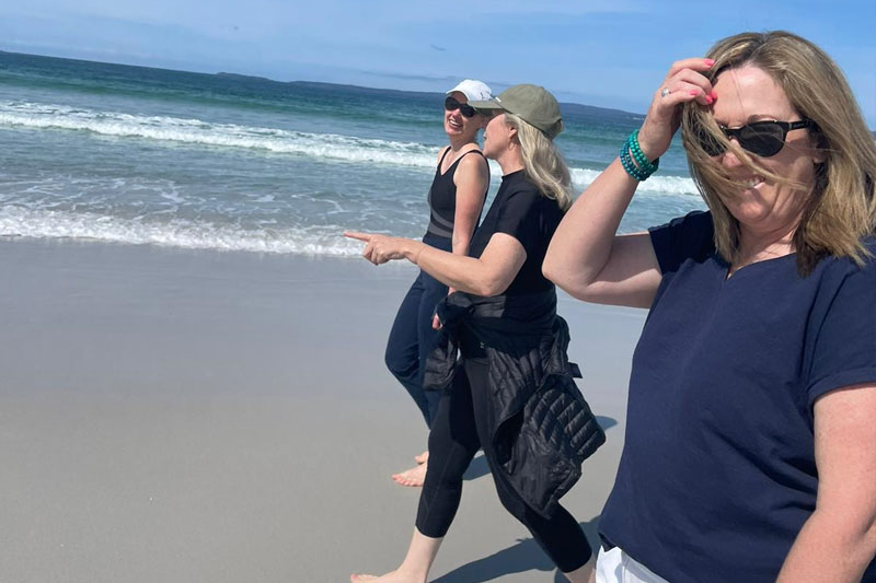 Walking along the beach in Noosa for a Girls Getaway