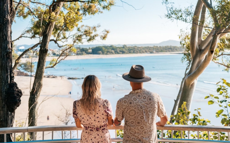 couple overlooking view at little cove